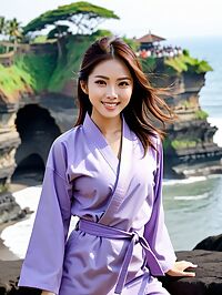 A Korean woman wearing purple karate robes in sunset lit Balinese scenery
